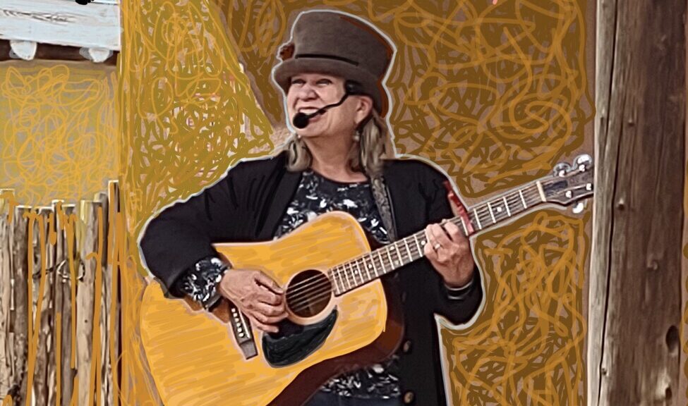 Enhanced photo of Jenni onstage at Fort Garland Museum.